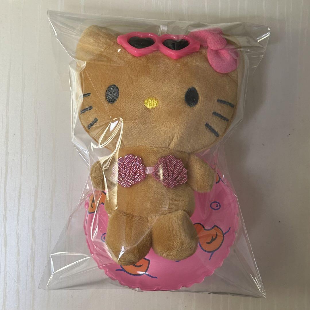 ハローキティ 水着 日焼けバージョン ぬいぐるみ　浮輪付き　新品タグ付2000 ハローキティ 水着 日焼けバージョン ぬいぐるみ 浮輪付き 新品