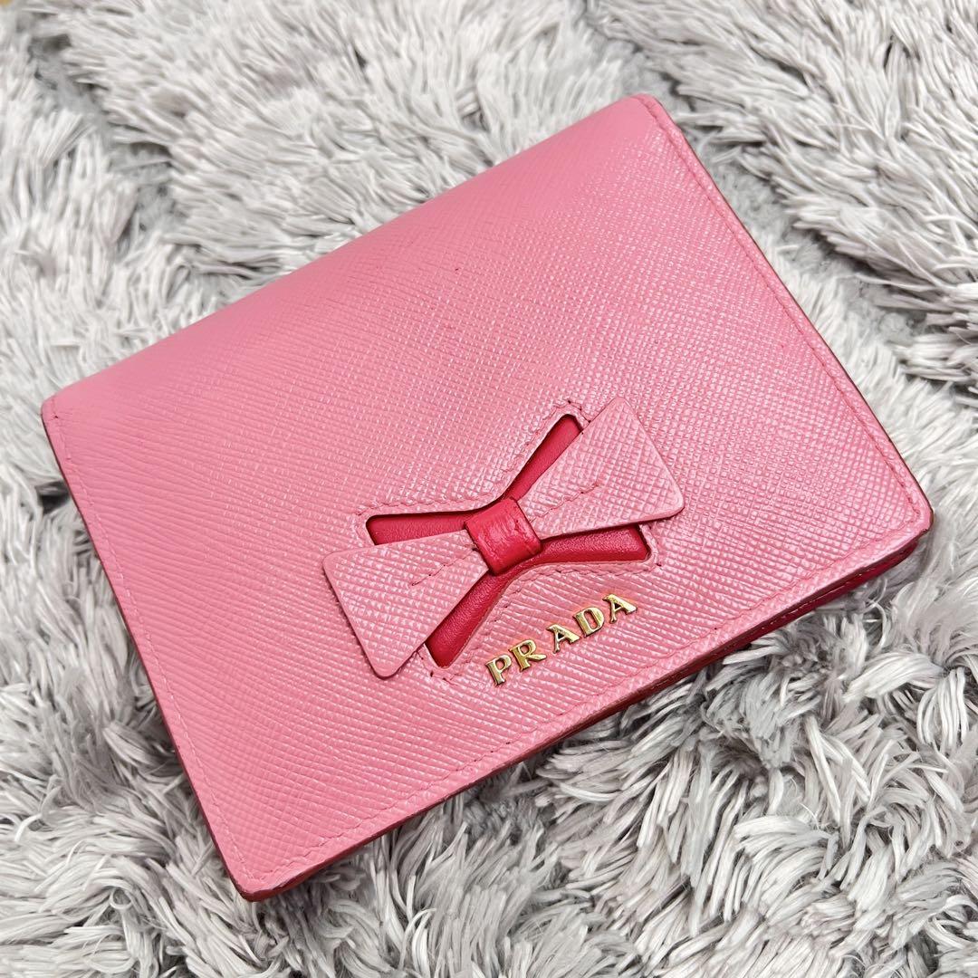 良品✨PRADA 折り財布　リボン　メタルロゴ　ピンク　バイカラー　レディース
