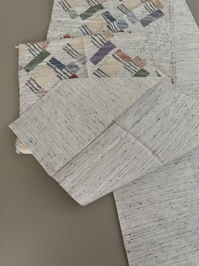 正絹 真綿紬 帯屋捨松 八寸名古屋帯 絣 幾何学 美品 画像12