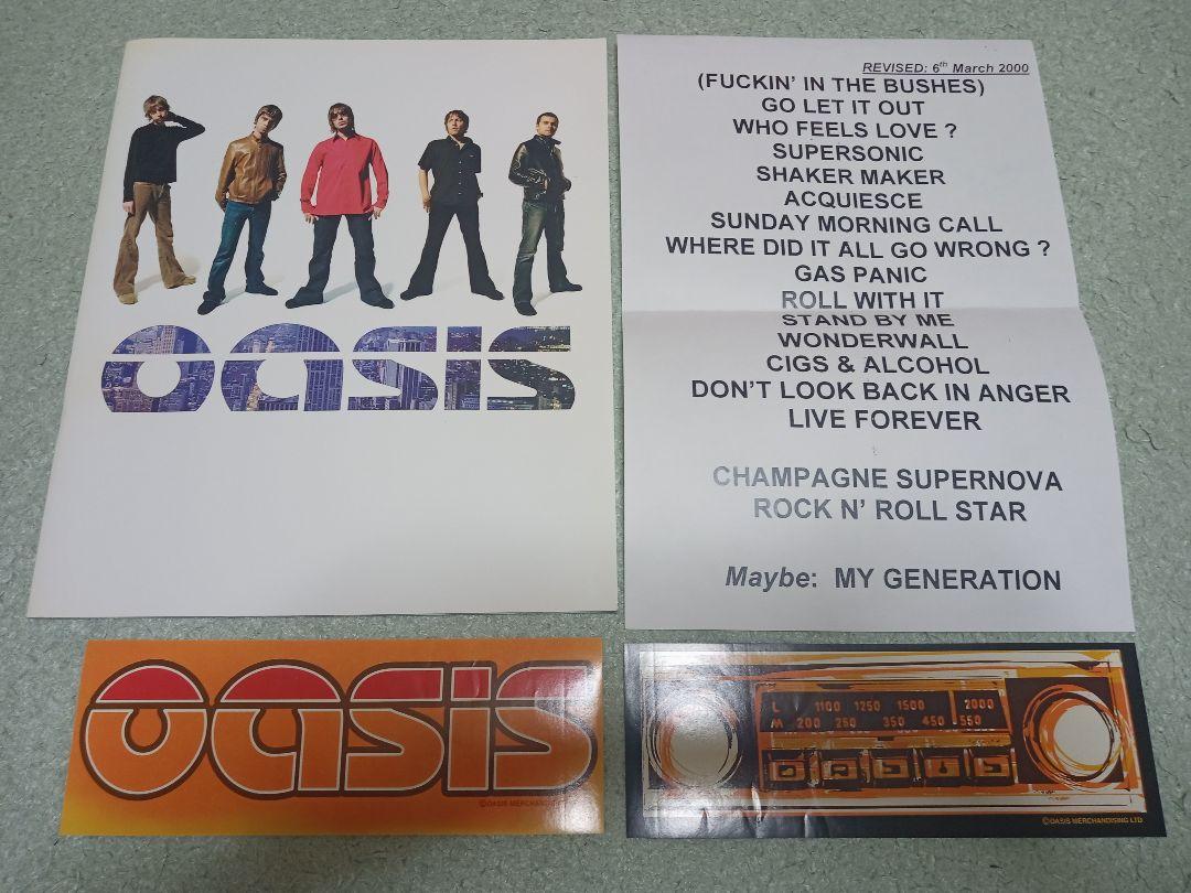 Oasisパンフレット、ステッカー2枚 2000年 曲目リスト、ポストカード付き