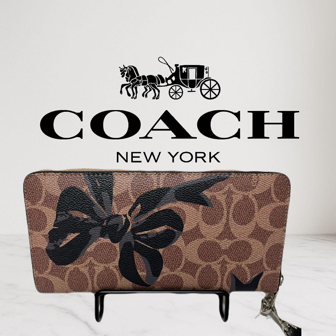 土日限定価格COACH 長財布 シグネチャー リボンプリント　cz326
