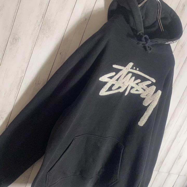 STUSSY ステューシー パーカー ブラック サガラ刺繍 ストックロゴ M(¥8,600) - メルカリ スマホでかんたん フリマアプリ