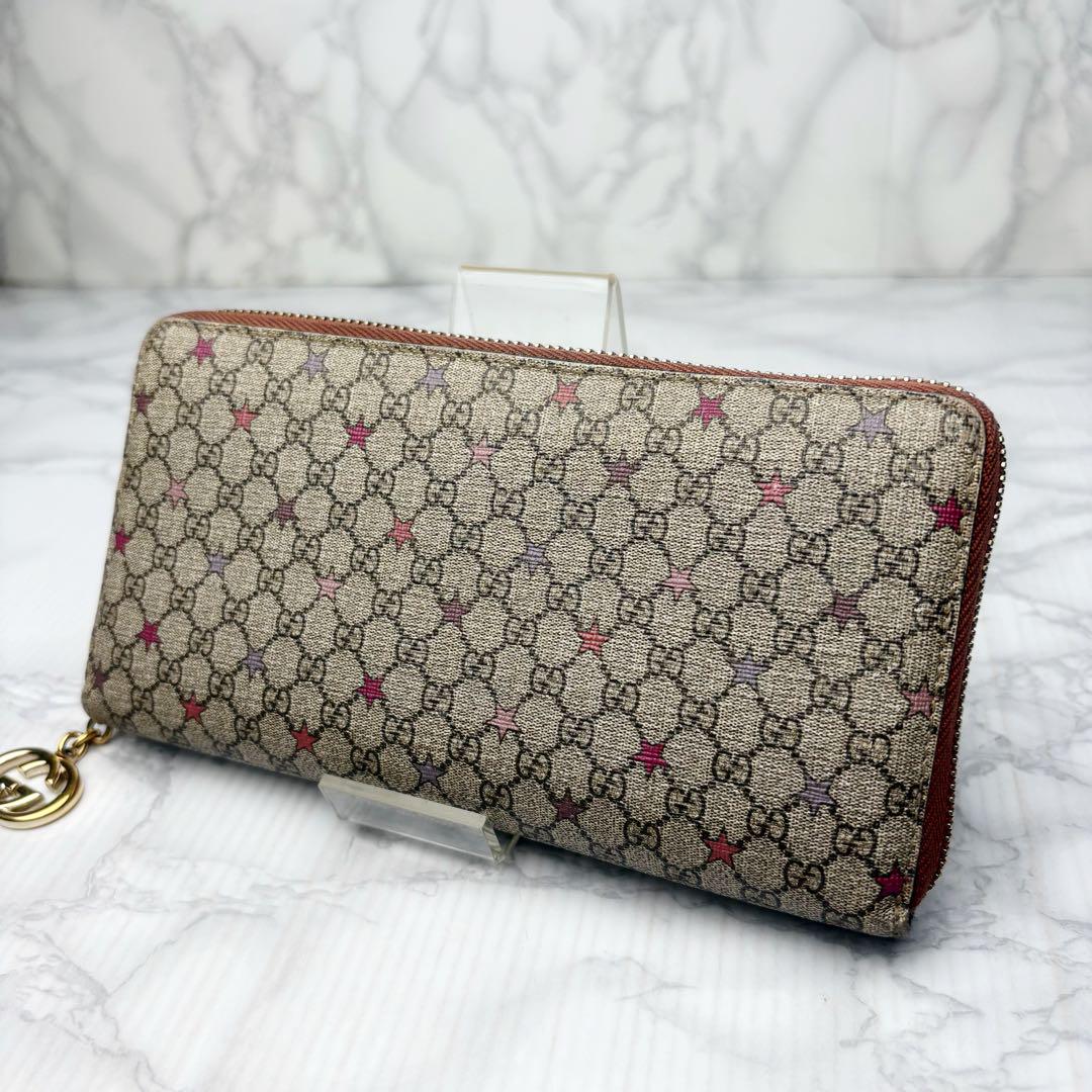 59 極美品 GUCCI ラウンドファスナー 長財布 PVC 星 xm1