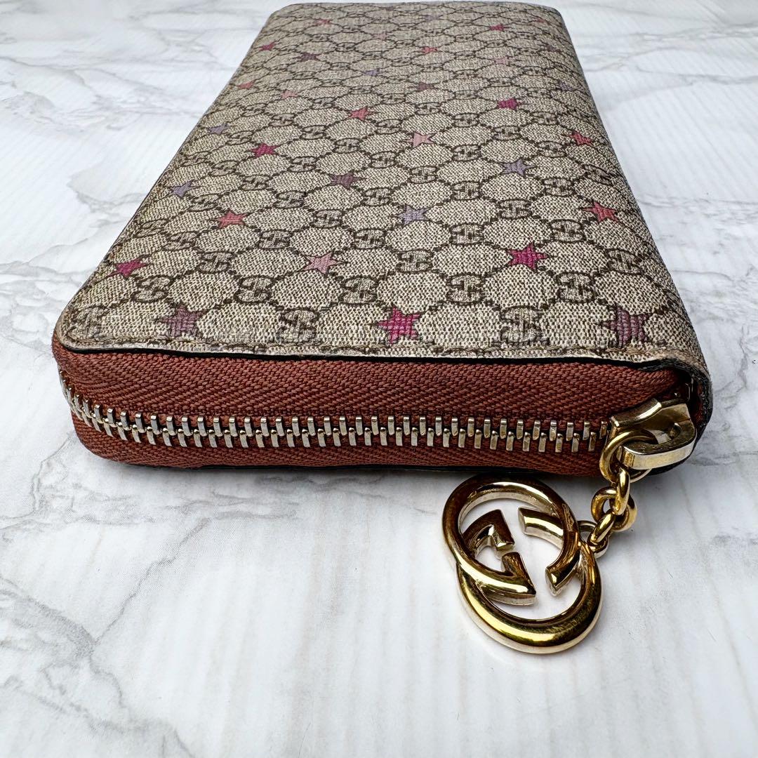 59 極美品 GUCCI ラウンドファスナー 長財布 PVC 星 xm1