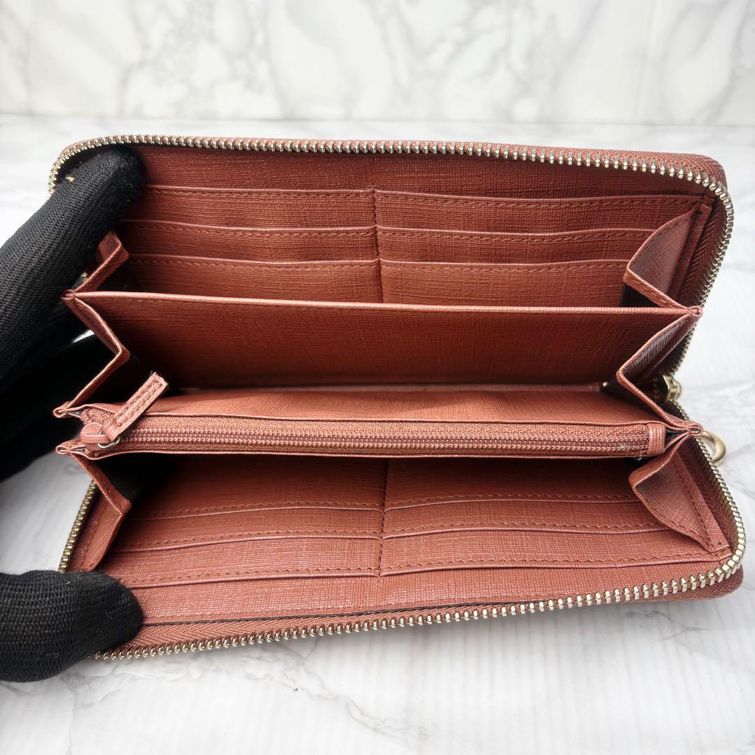 59 極美品 GUCCI ラウンドファスナー 長財布 PVC 星 xm1