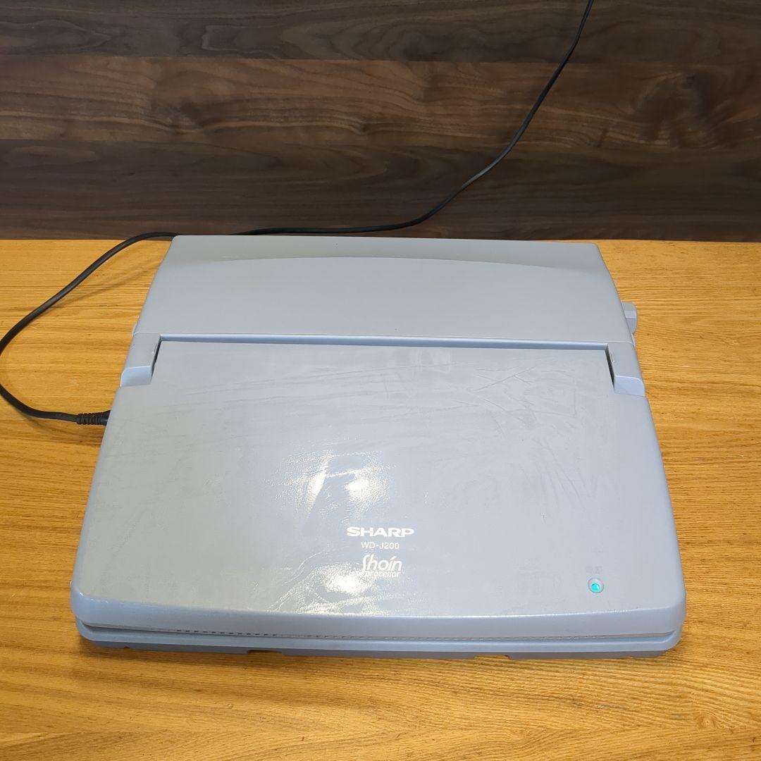 美品！SHARP/シャープ WD-J200 書院 ワープロ Amazon | SHARP ワープロ 書院 WD-J200 | コピー機アクセサリ
