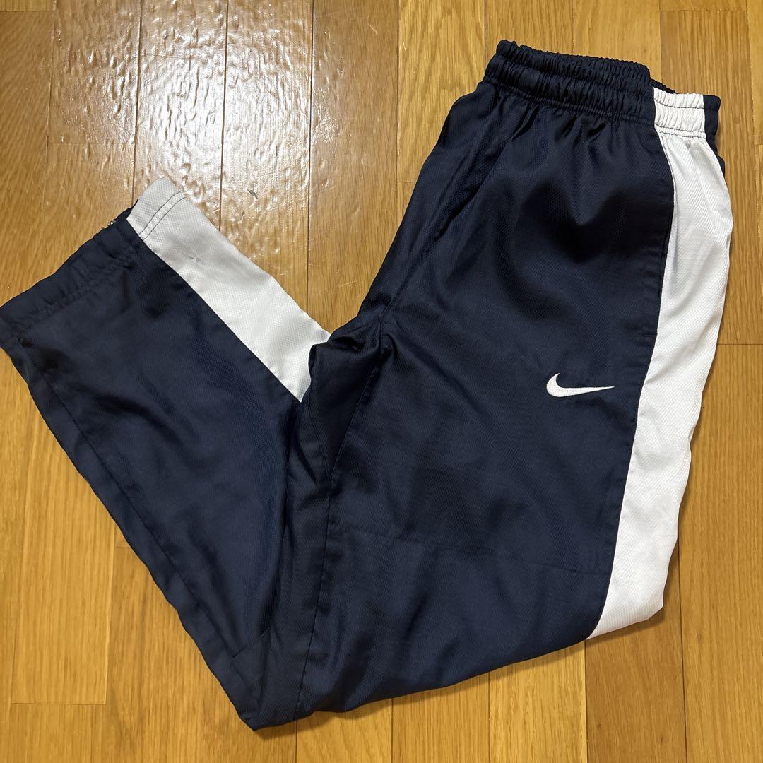【海外品】レア NIKE トラックパンツY2K 刺繍ロゴ 裾ジップ NIKE 00s y2k トラックパンツ 裾ジップ 膝ロゴ グレー - メルカリ