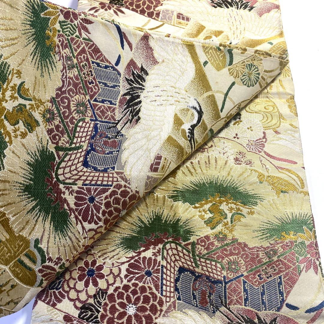 丸帯絹両面全通鶴御所車ベージュ白金色紫緑黒花柄