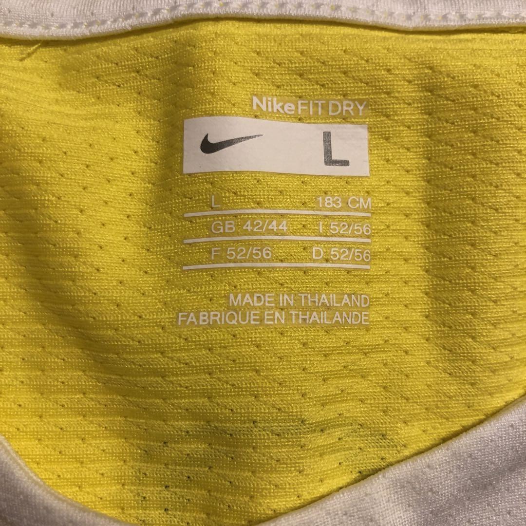 トップス 00s NIKE total90 no sleeve shirts y2k