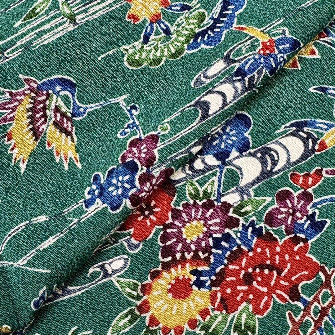 小紋 中振り 型染め 縮緬 花柄 桔梗 家屋 鳥 緑 NK-1189