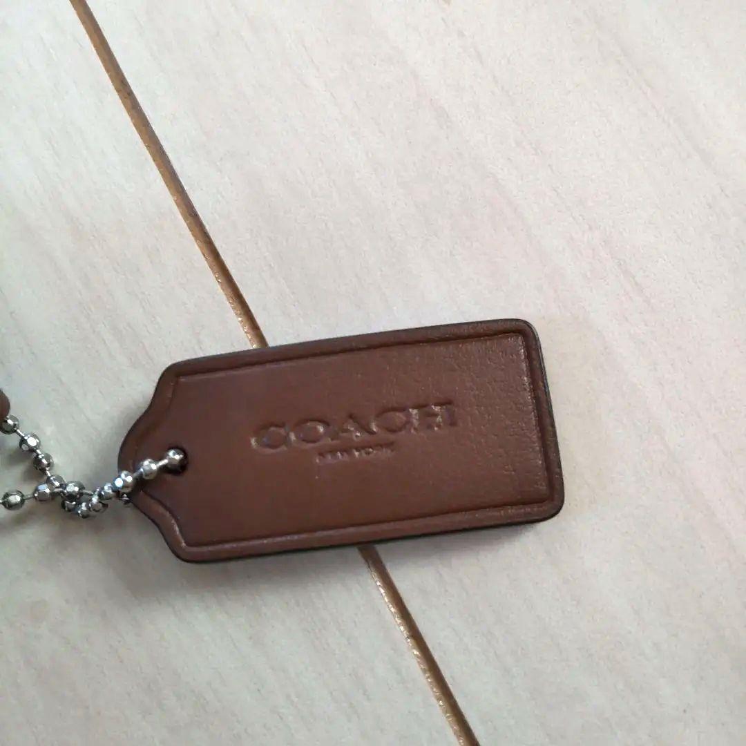 コーチシグネチャーボディバック レディース