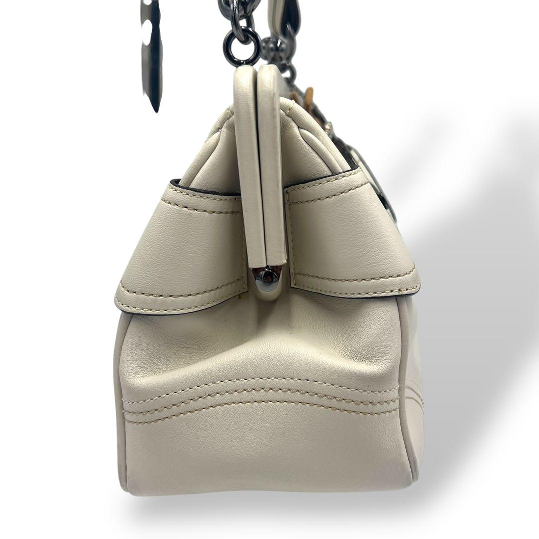 美品◇COACH◇がま口ハンドバッグ。