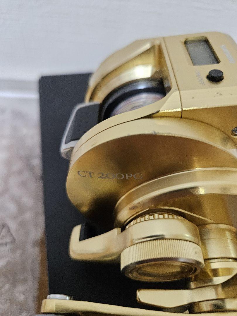 い*し様 SHIMANO オシアコンクエスト CT 200PG ゴールド両軸リー