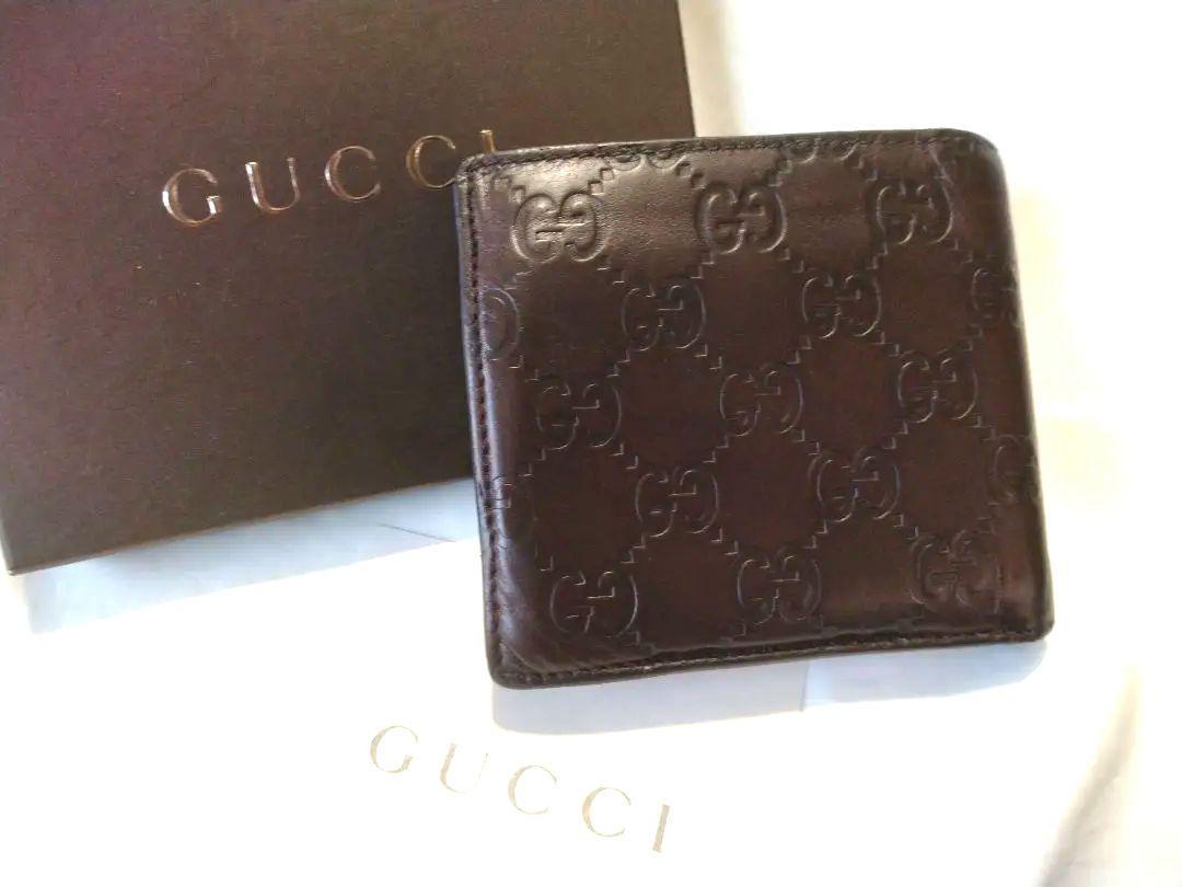 GUCCI グッチ二つ折り財布シマレザーダークブラウン - メルカリ