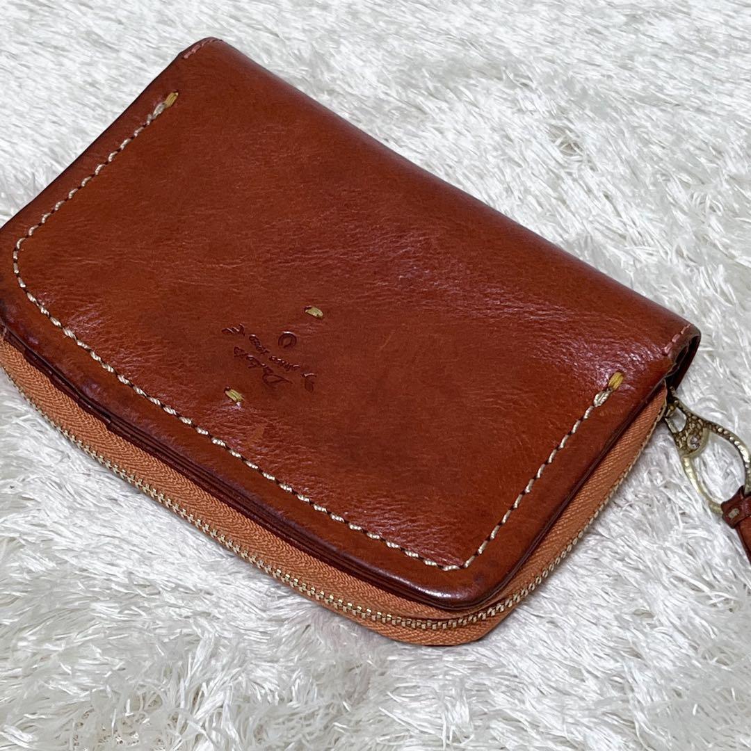 ダコタ 折り財布 レザー スワロフスキー ラウンドファスナー