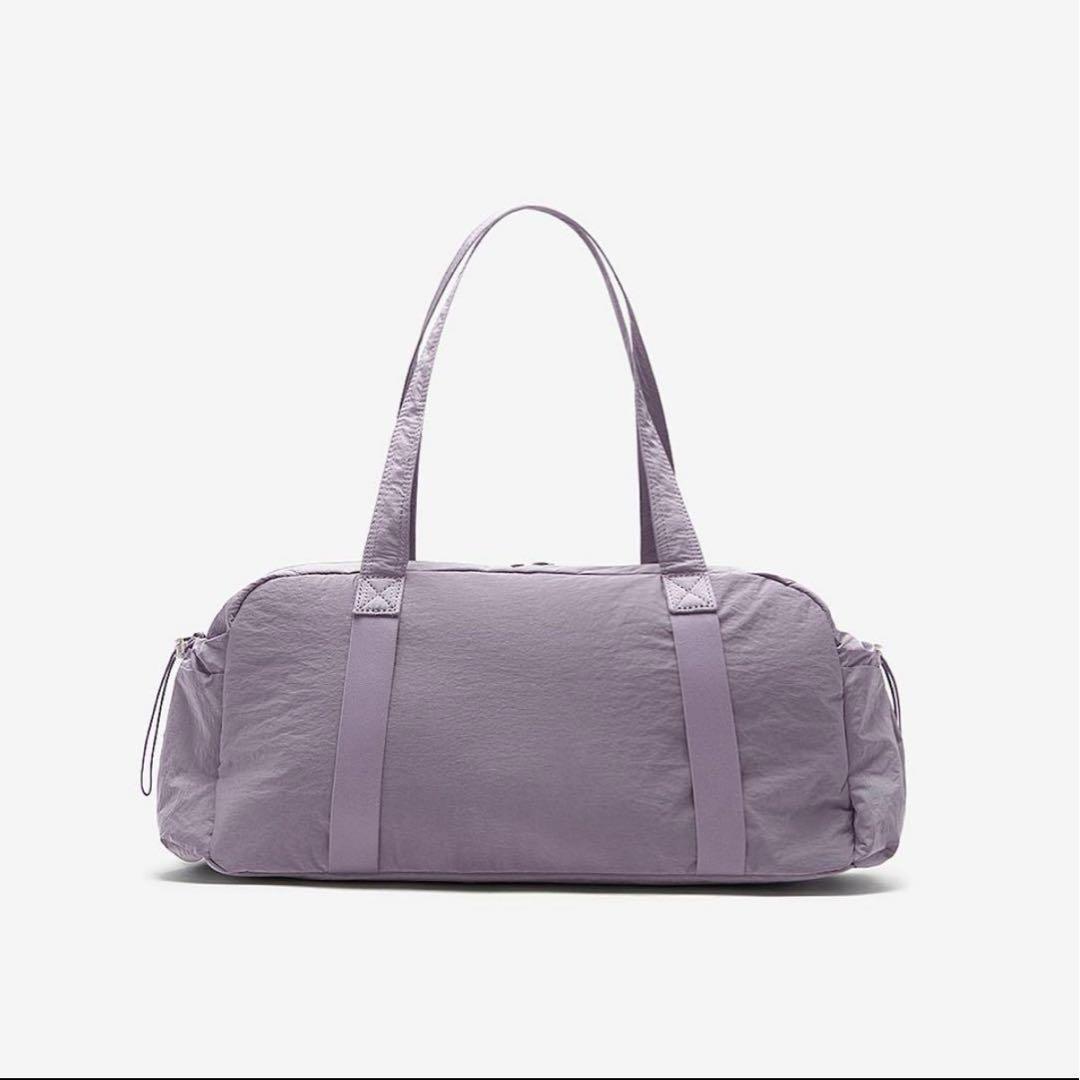 NEW BALANCE Glossy ribbon duffel bag - メルカリ