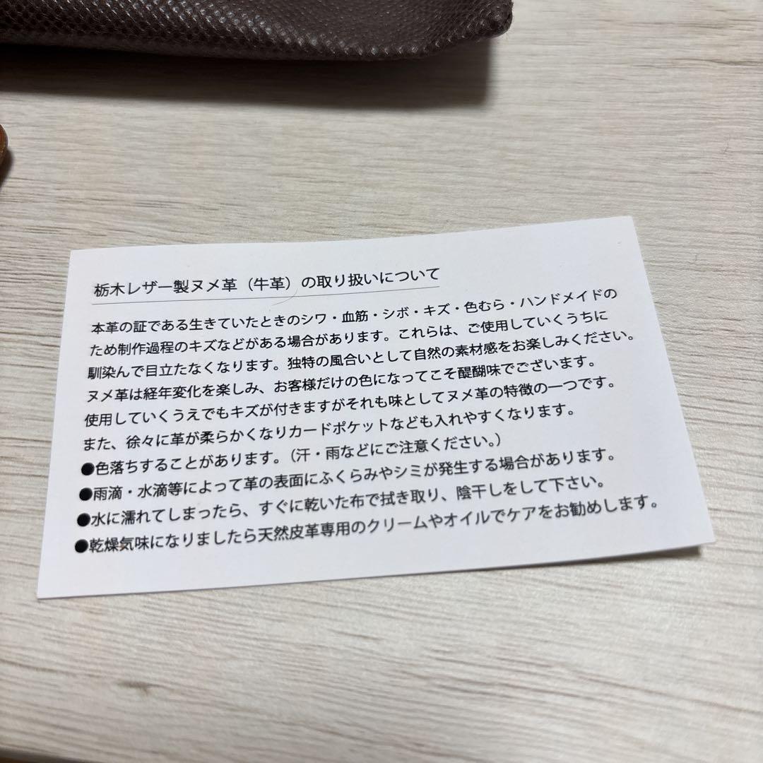 オレンジ 本革 二つ折り財布 収納袋付き