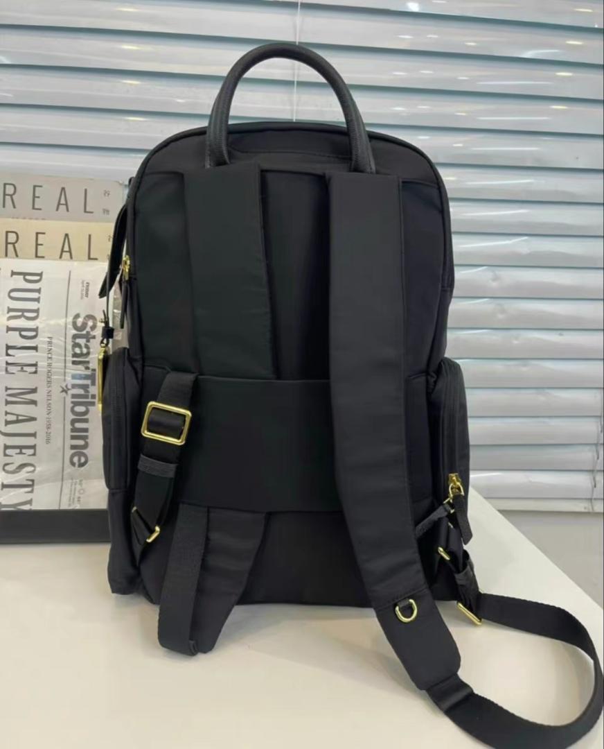 TUMI セリーナ ゴールドジッパー - メルカリ