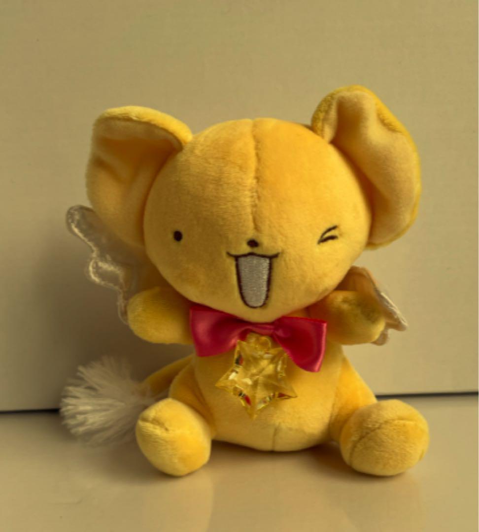 ウィンクする黄色いぬいぐるみ
