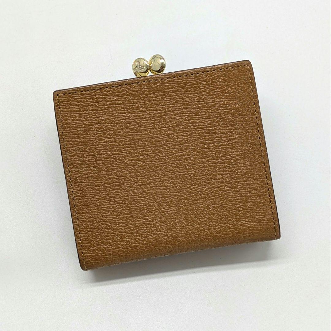美品✨️ヴィヴィアンウエストウッド 二つ折り財布 キャメル 口金 ゴールドオーブ 美品✨️ヴィヴィアンウエストウッド 二つ折り財布 キャメル 口金 ゴールドオーブ