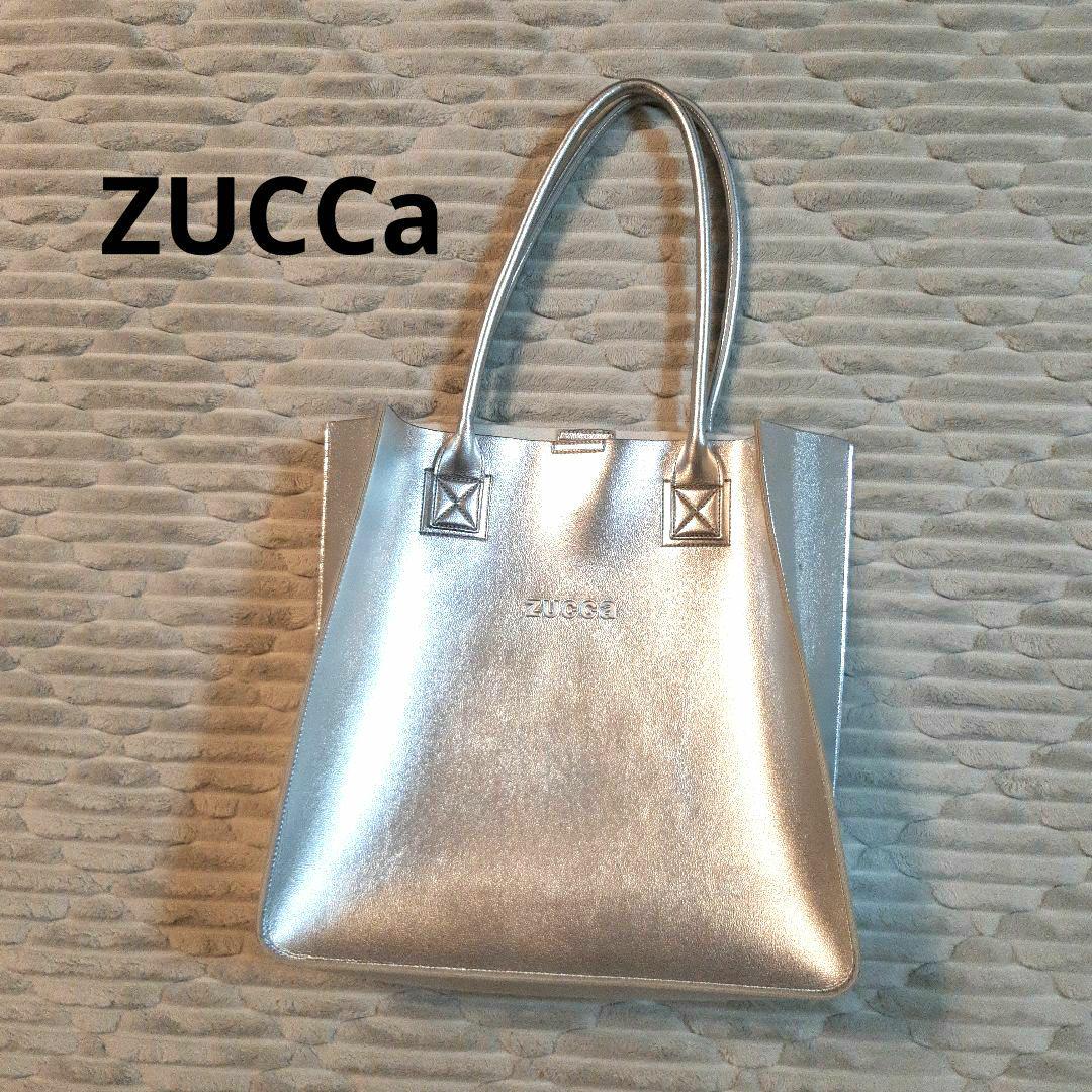 出産祝い zucca フェイクレザーロゴバッグ シルバー - メルカリ バッグ