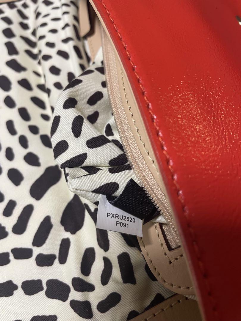 kate spade レッド クラッチバッグ - メルカリ