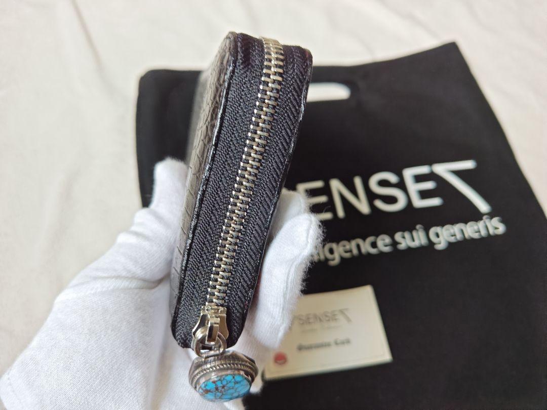 ７SENSE クロコダイルポロサスラウンドジップ長財布