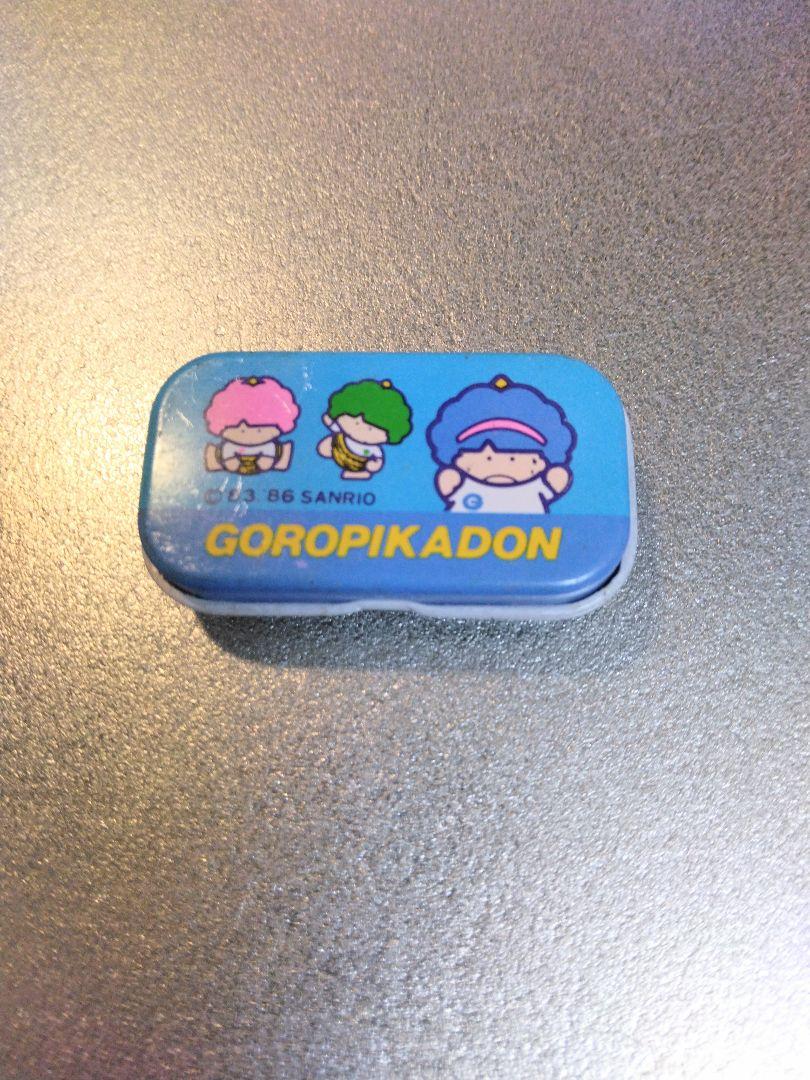 昭和レトロ サンリオ ゴロピカドン缶ペンケース - メルカリ