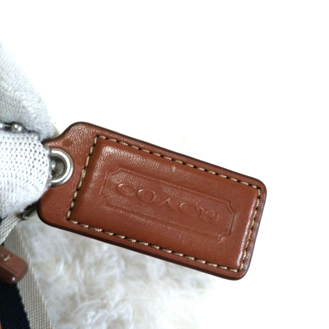 COACH コーチ レザー 型押しロゴ チャーム ストライプ柄 ボディバッグ