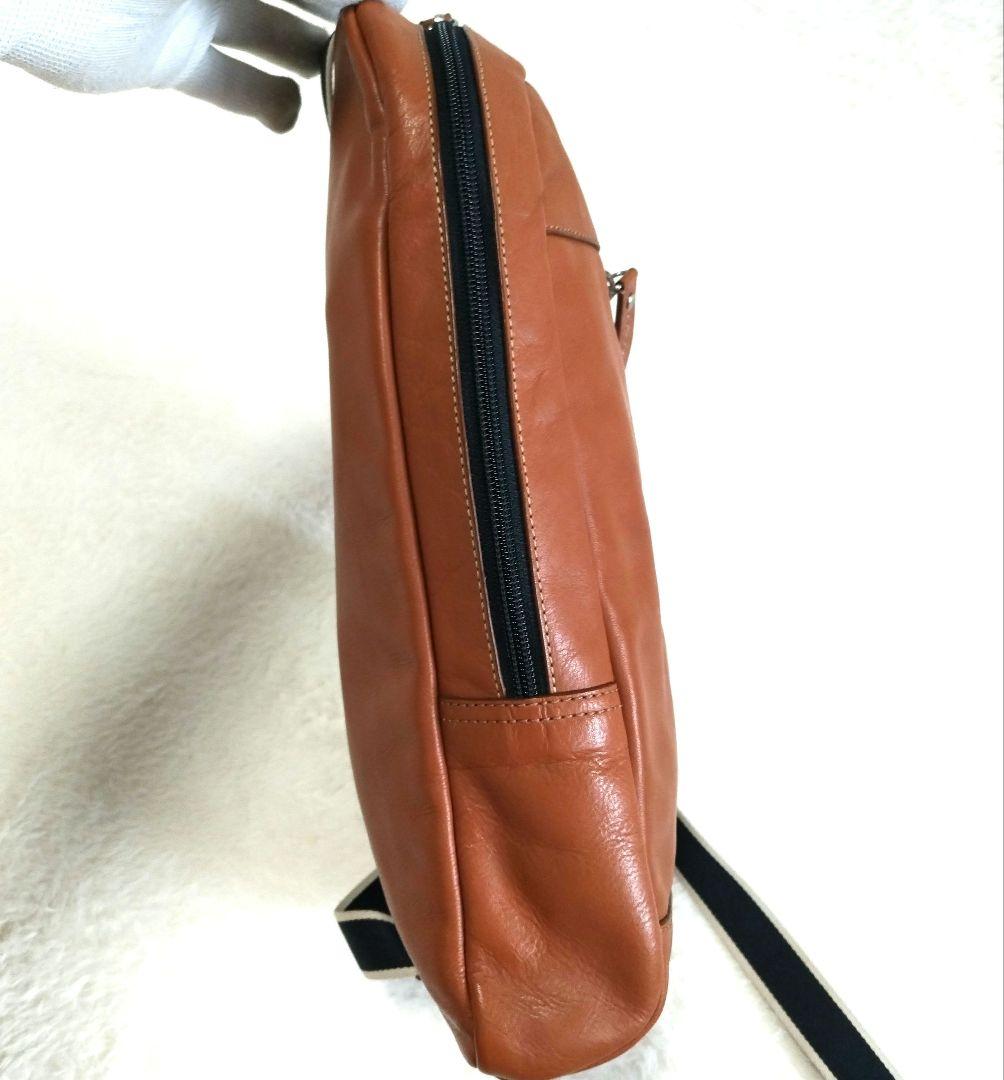 COACH コーチ レザー 型押しロゴ チャーム ストライプ柄 ボディバッグ