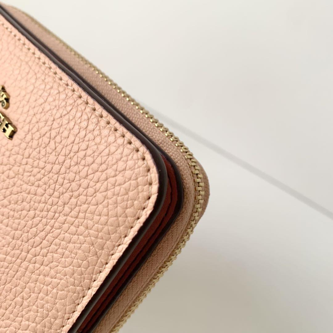 【COACH】コーチ　二つ折り財布　ビルフォールドウォレット　ペールオレンジ