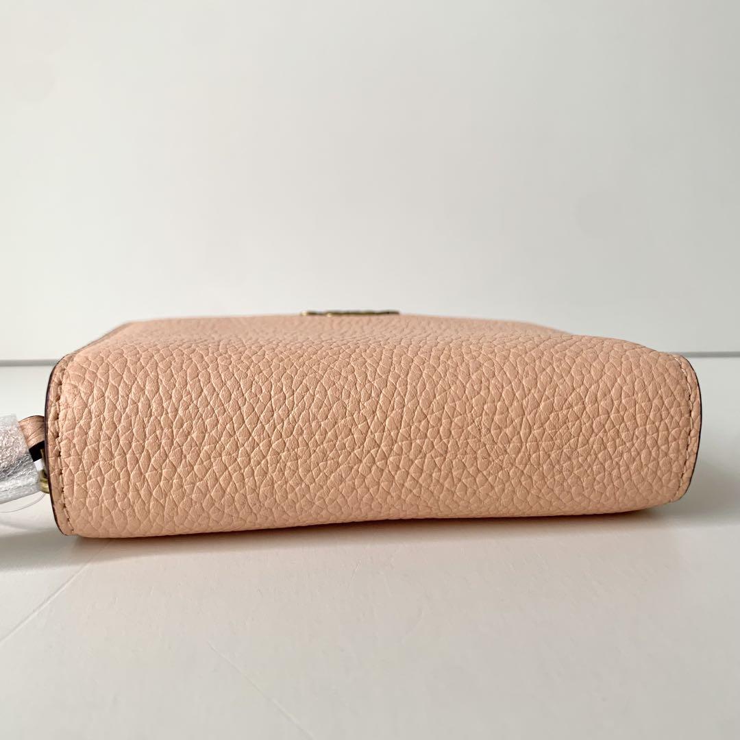 【COACH】コーチ　二つ折り財布　ビルフォールドウォレット　ペールオレンジ