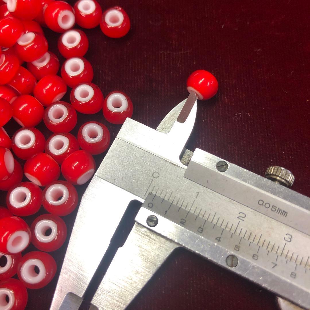 朱赤色ホワイトハーツ500粒約7.2ミリ〜8ミリ幅前後、3ミリ鹿紐用