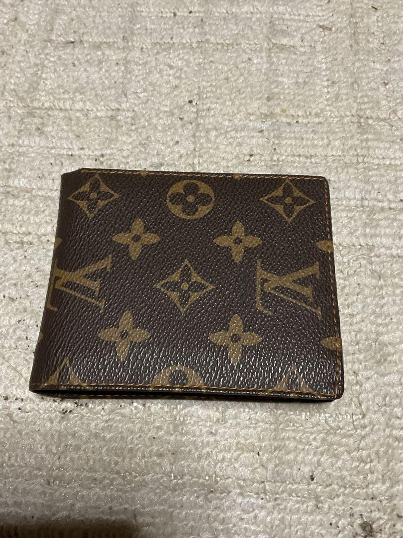 ルイ・ヴィトン小銭入れ財布。新品／未使用。【ブランド品　お札　カード入れ】