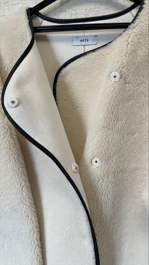 センソユニコ黒とグレーのロングコート フード付き コート