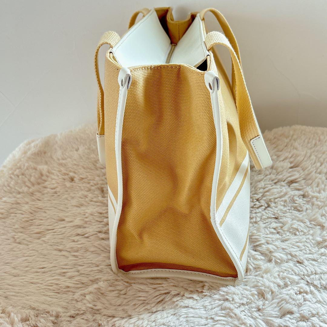 courreges トートバッグ キャンバス レザー パイピング ロゴ A4 courreges トートバッグ キャンバス レザー パイピング ロゴ A4