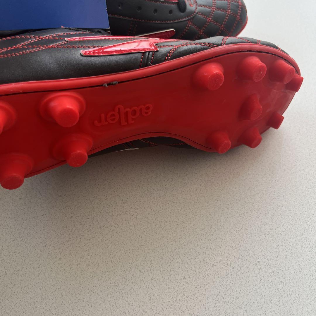 adler サッカーシューズ 黒赤