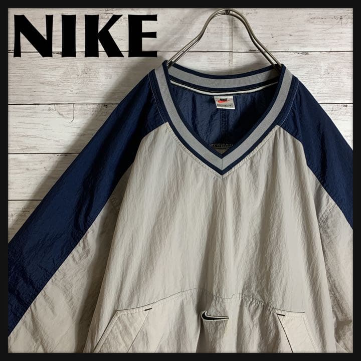 高い素材 古着 90s ナイキ NIKE ナイロンプルオーバー 刺繍ロゴ くすみ