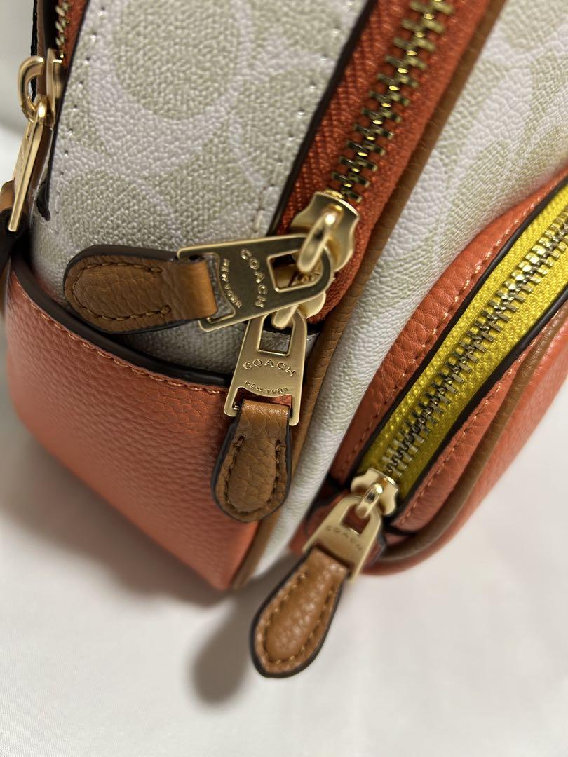 COACHバタフライプリント リュック