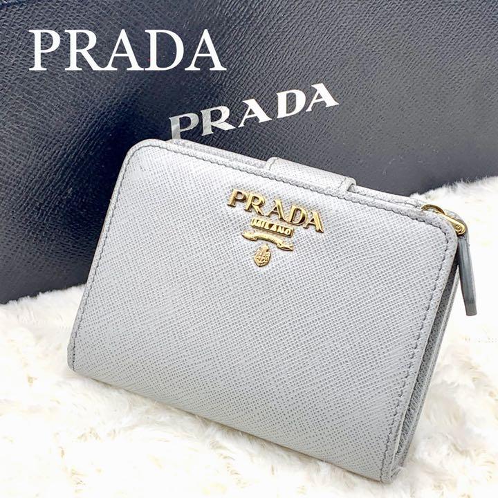 ホワイト系最終値下げPRADA サフィアーノ バイカラー2つ折財布 1ML018 ...