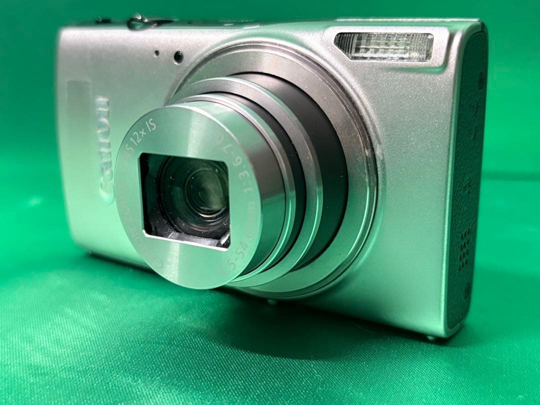 ⭐️ M1006A⭐️ Canon IXY 650 PC2274 Canon IXY 650 Digital Camera, 12x Zoom, Full HD, Silver Bundle