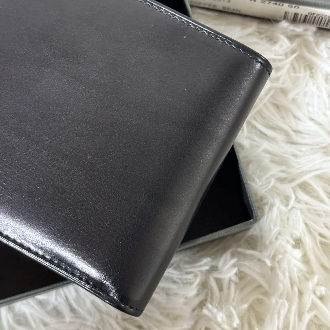 新品未使用✨GUCCI グッチ　二つ折り財布　メタルロゴ　ブラック　レザー