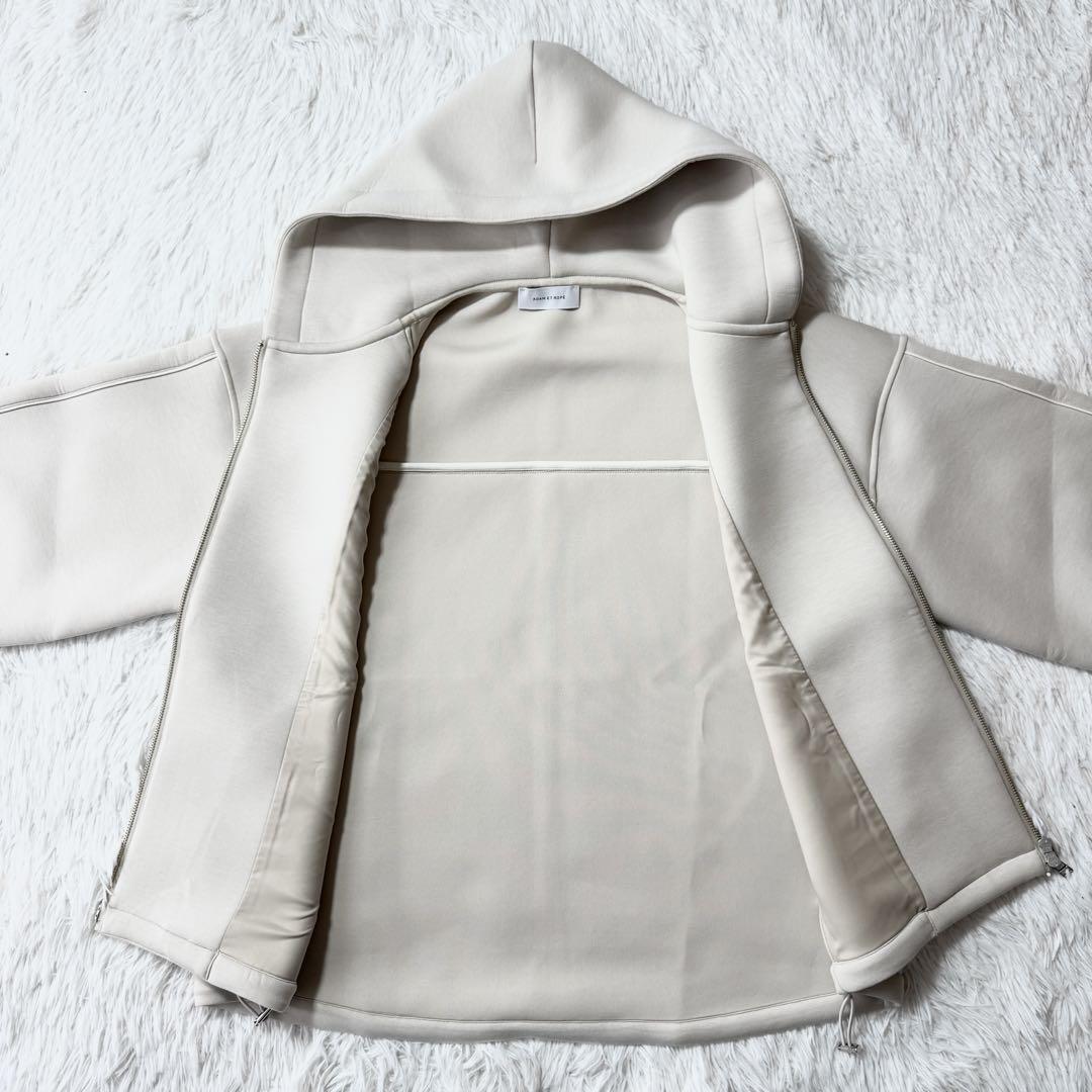 ADAM ET ROPE サステナブル フーディージップブルゾン キナリ