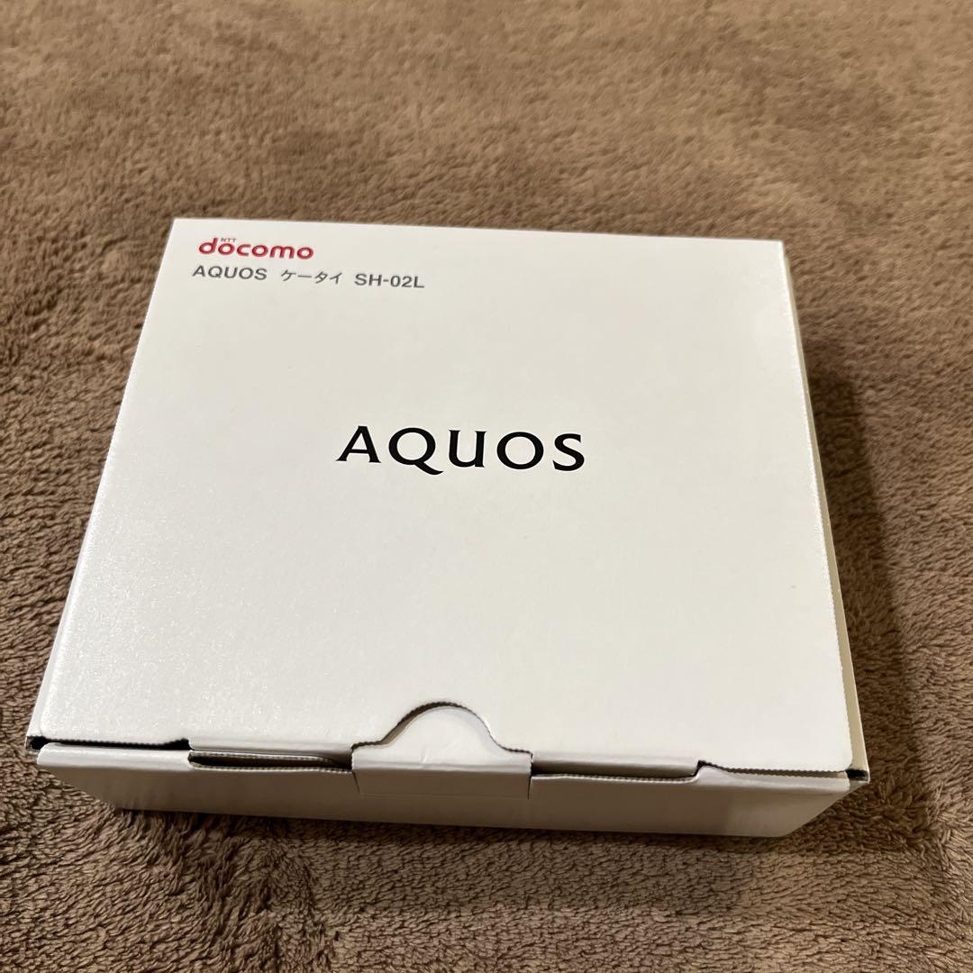 【値下げ】 docomo AQUOSケータイSH-02L 新品未使用 ゴールド 携帯電話本体