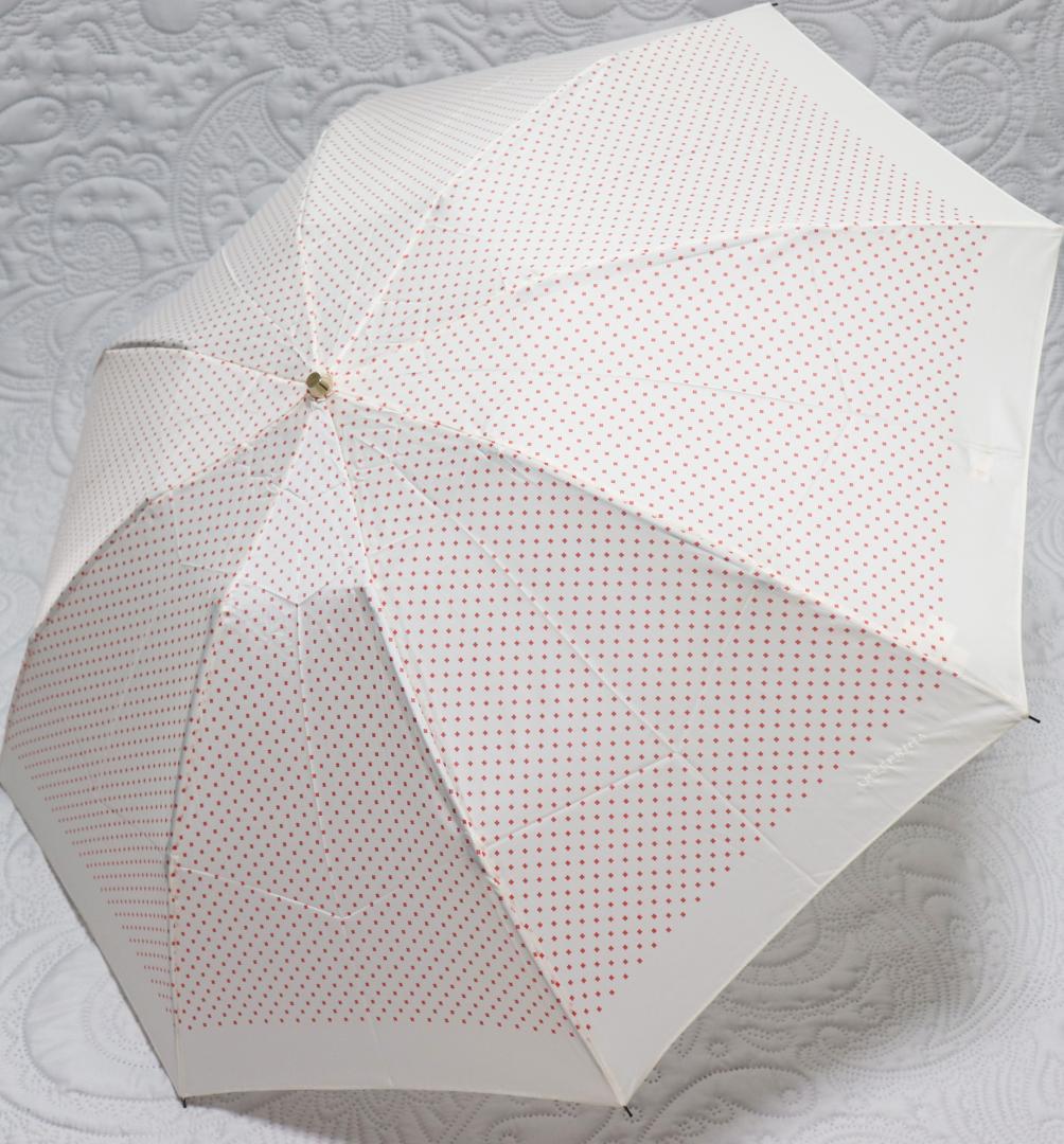 【新品未使用】アンテプリマ ♡ 折り畳み傘 晴雨兼用 総柄 刺繍 チャーム付き 新品【アンテプリマ】晴雨兼用折り傘 フィオーリ総柄 ロゴ刺繍