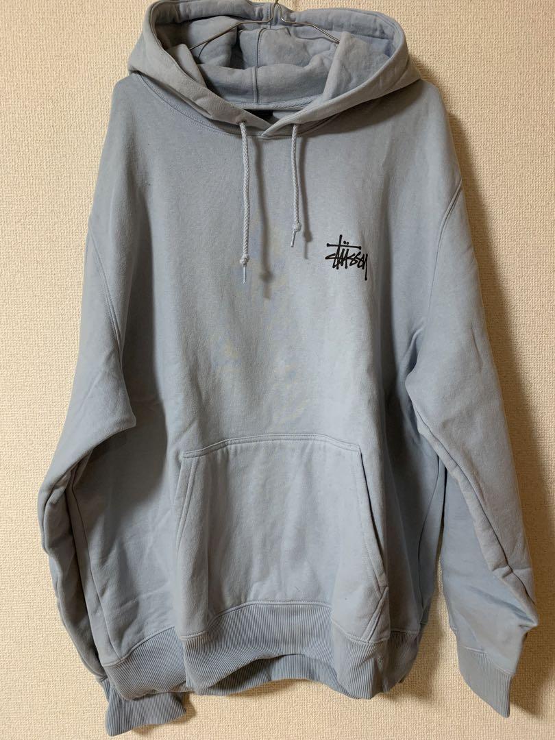【70％OFF】 Stussy 水色 XL パーカー バックロゴ トップス
