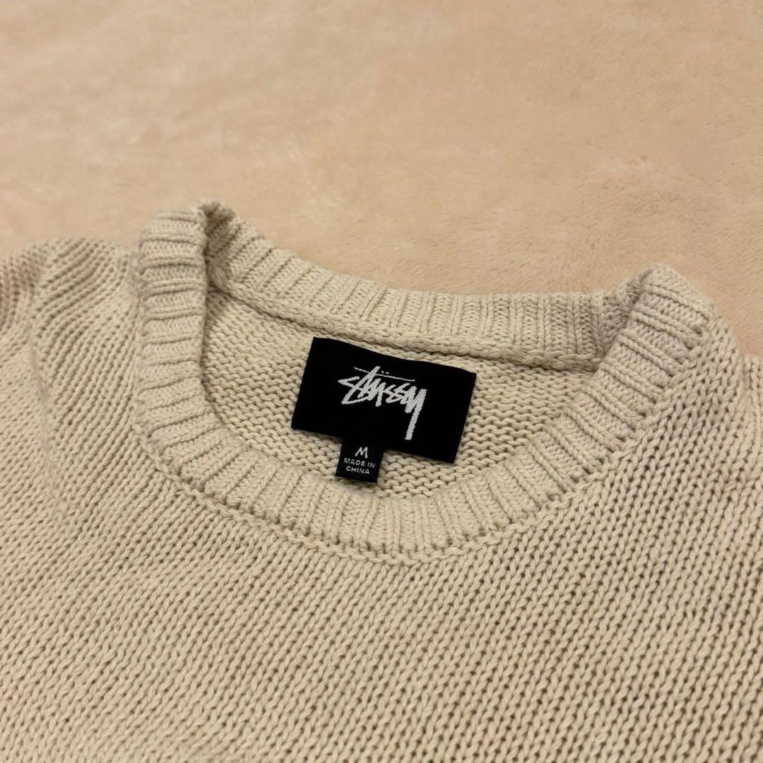 STUSSY クリーム色 ニットセーター - メルカリ