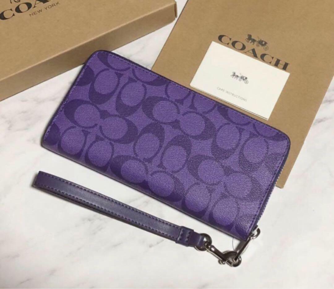COACH ラウンドファスナー 長財布 シグネチャーキャンバス パープル