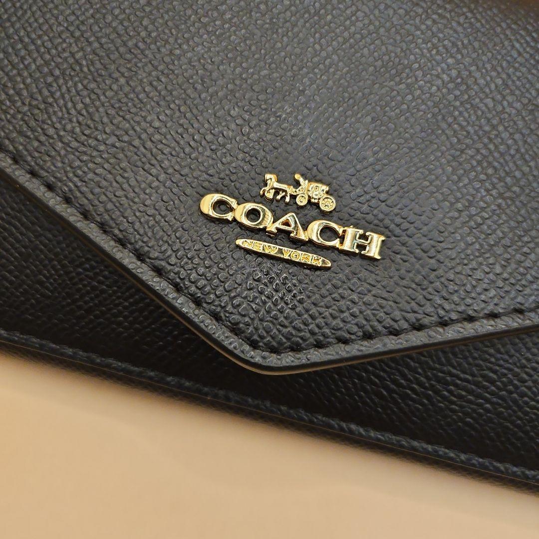 COACHエンベロープ長財布