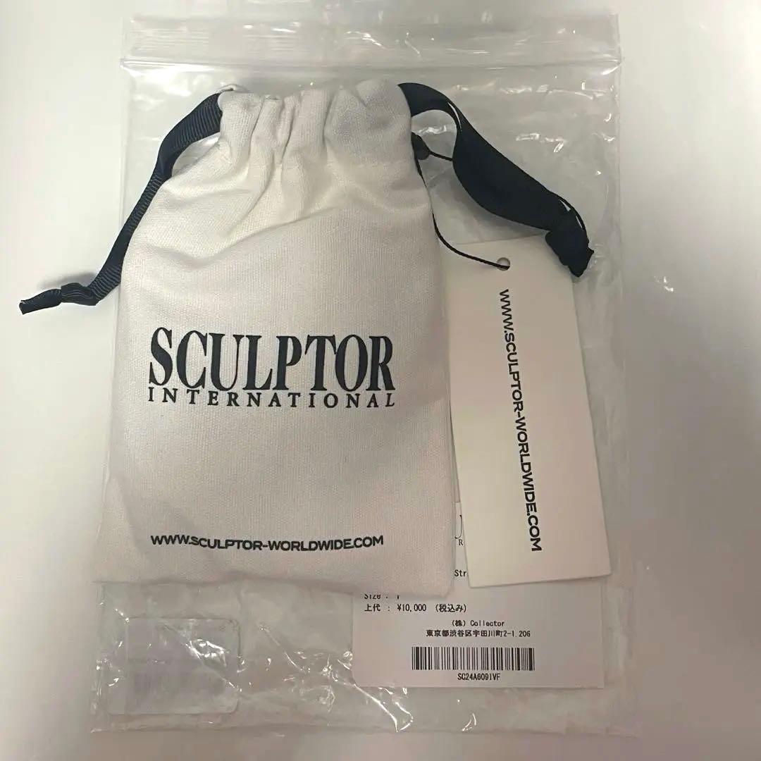 Sculptor Cross Leather Strap Wallet Sculptor Cross Leather Strap Wallet